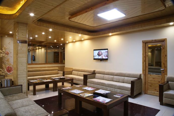 Imagen del bar/restaurante del Hotel The Holiday Heights Manali. Foto 5