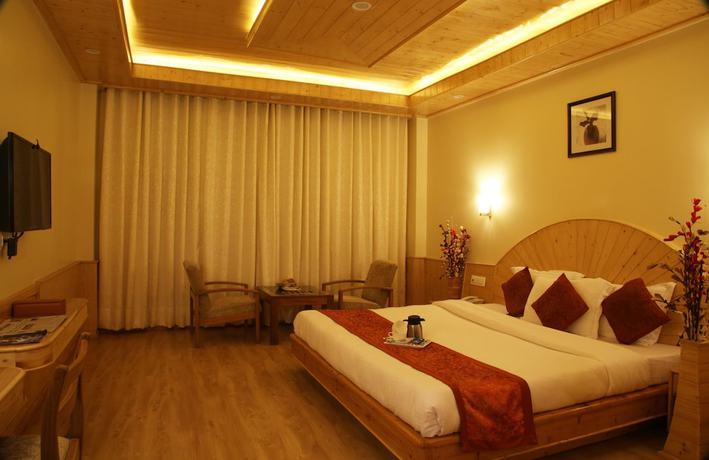 Imagen de la habitación del Hotel The Holiday Heights Manali. Foto 11