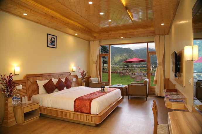 Imagen de la habitación del Hotel The Holiday Heights Manali. Foto 12