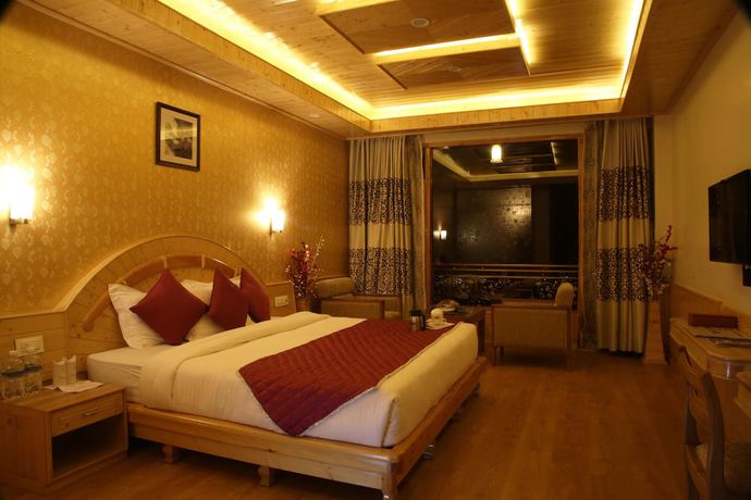 Imagen de la habitación del Hotel The Holiday Heights Manali. Foto 13