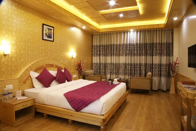 Imagen de la habitación del Hotel The Holiday Heights Manali. Foto 14