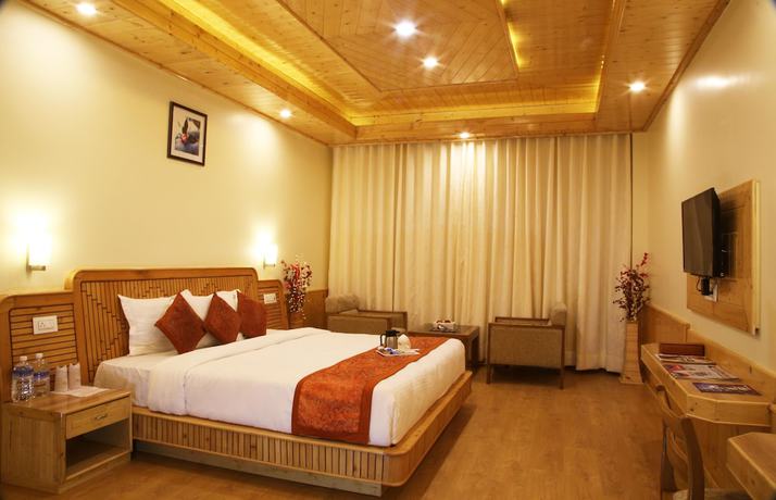 Imagen de la habitación del Hotel The Holiday Heights Manali. Foto 15