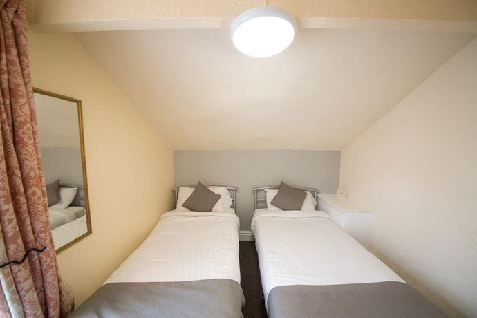 Imagen de la habitación del Hotel The Hollingdales. Foto 10