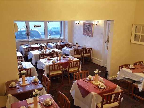Imagen del bar/restaurante del Hotel The Hollingdales. Foto 5
