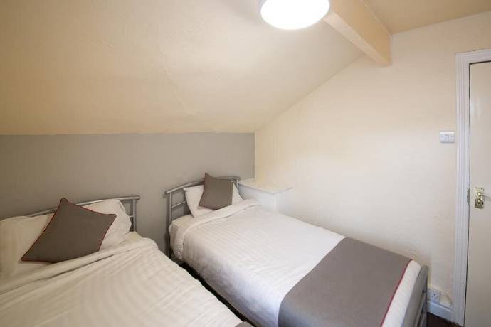 Imagen de la habitación del Hotel The Hollingdales. Foto 15