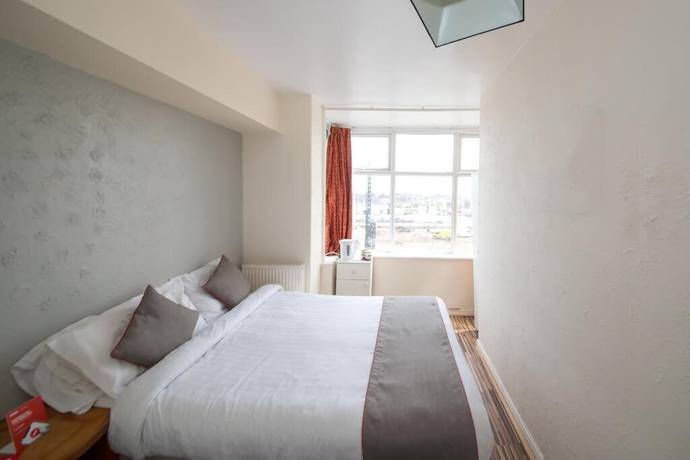 Imagen de la habitación del Hotel The Hollingdales. Foto 19