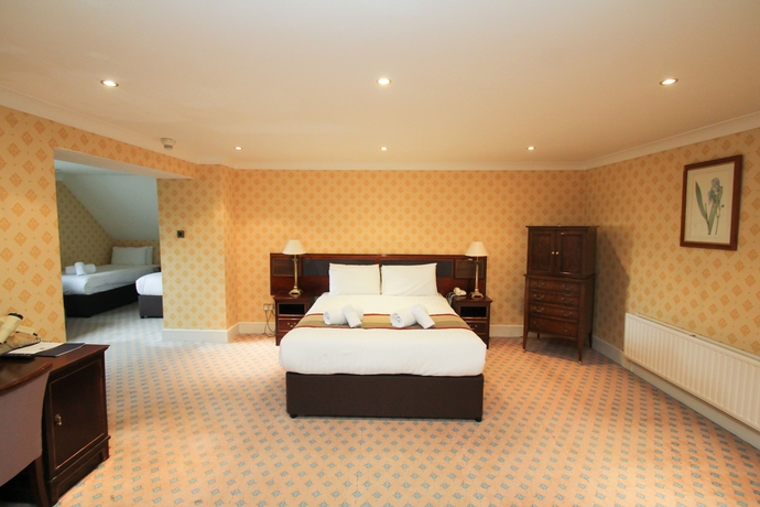 Imagen de la habitación del Hotel The Holt. Foto 6