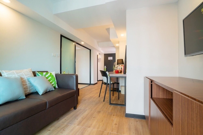 Imagen de la habitación del Hotel The Home, Bangkok. Foto 3