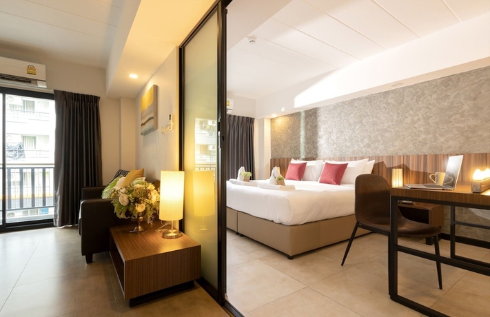 Imagen de la habitación del Hotel The Home, Bangkok. Foto 8
