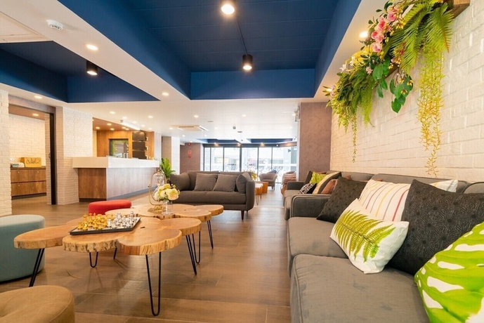Imagen de los interiores del Hotel The Home, Bangkok. Foto 19
