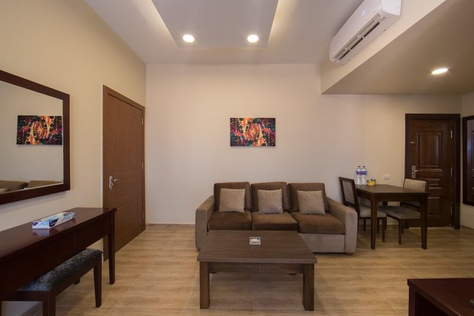 Imagen de la habitación del Hotel The Home, Sheikh Zayed City. Foto 4