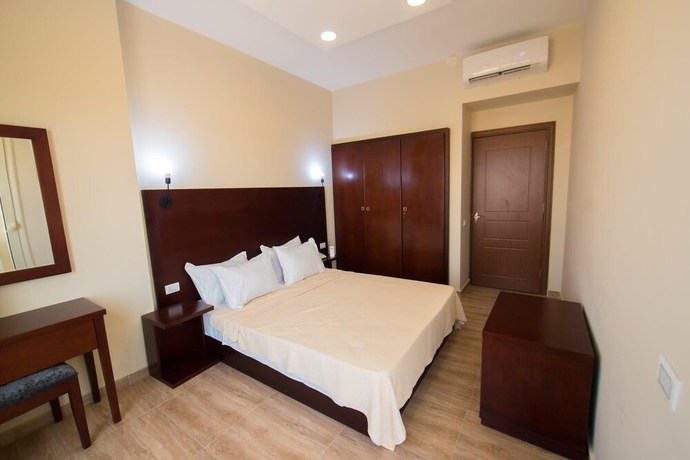 Imagen de la habitación del Hotel The Home, Sheikh Zayed City. Foto 6