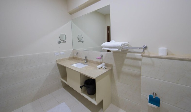 Imagen de la habitación del Hotel The Home, Sheikh Zayed City. Foto 12