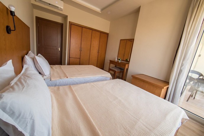 Imagen de la habitación del Hotel The Home, Sheikh Zayed City. Foto 16