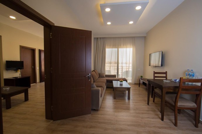Imagen de la habitación del Hotel The Home, Sheikh Zayed City. Foto 19