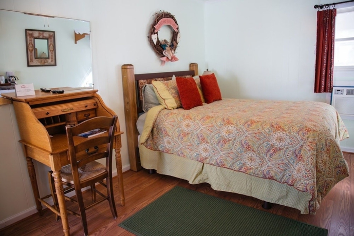 Imagen de la habitación del Hotel The Homestead Inn. Foto 2