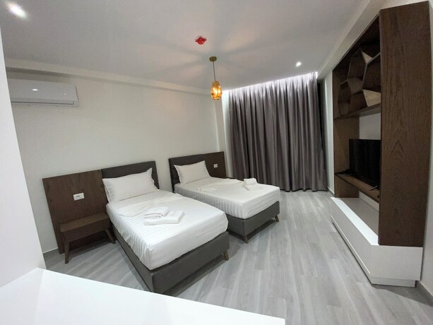 Imagen de la habitación del Hotel The Honeycomb Boutique. Foto 19