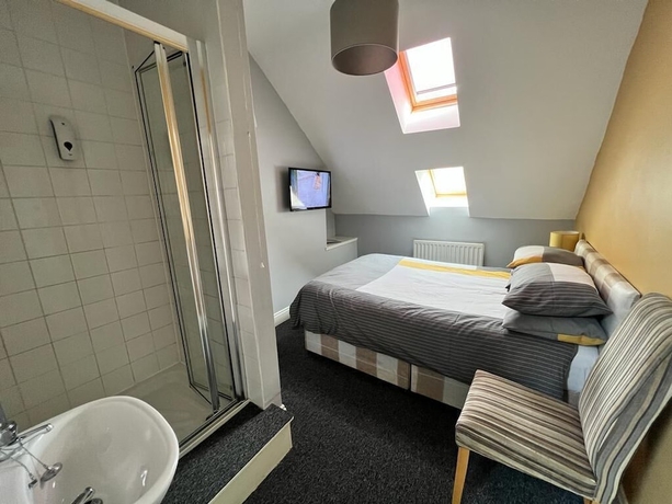 Imagen de la habitación del Hotel The Hoptimist. Foto 13