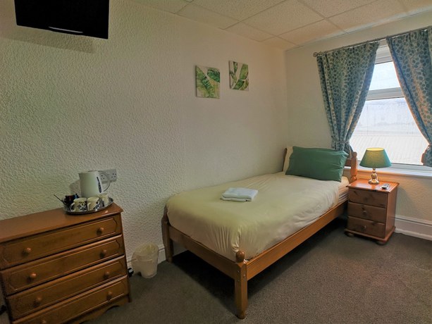 Imagen de la habitación del Hotel The Hopton. Foto 16