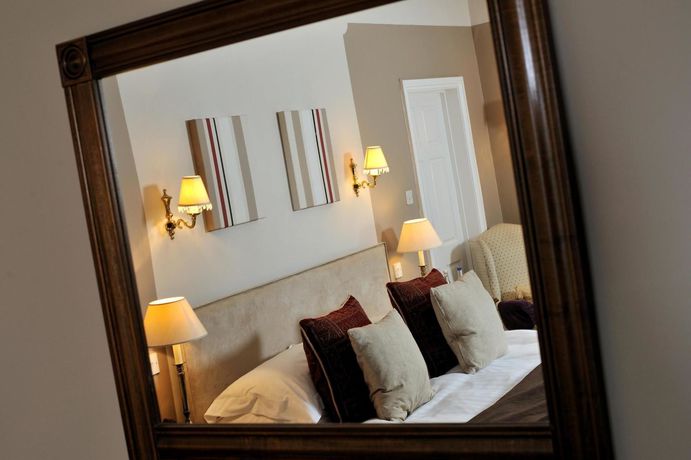 Imagen de la habitación del Hotel The Horn Of Plenty. Foto 8