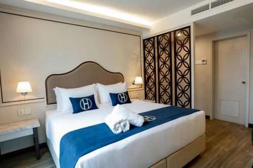 Imagen de la habitación del Hotel The Host. Foto 18