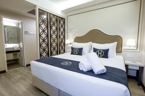 Imagen de la habitación del Hotel The Host. Foto 19