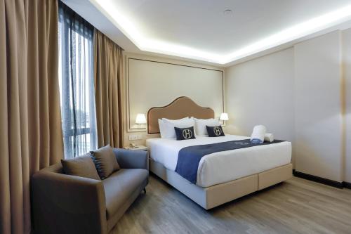 Imagen de la habitación del Hotel The Host. Foto 20