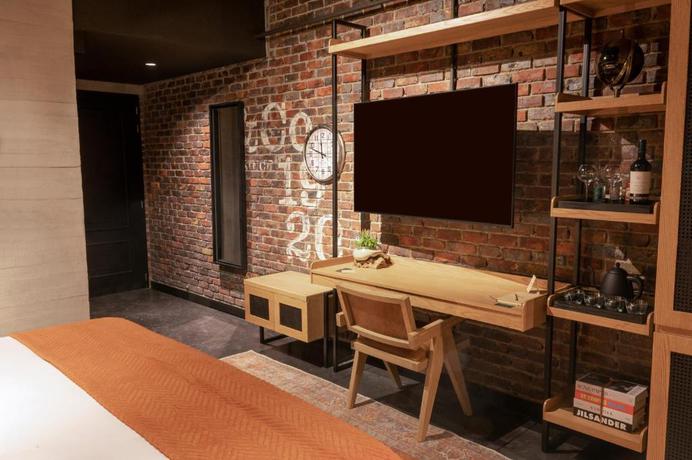 Imagen de la habitación del Hotel The Host Medellin Only Adults. Foto 10