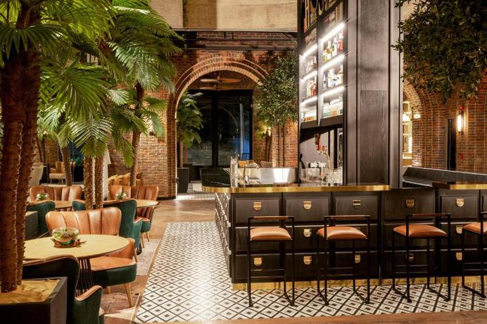 Imagen del bar/restaurante del Hotel The Host Medellin Only Adults. Foto 6