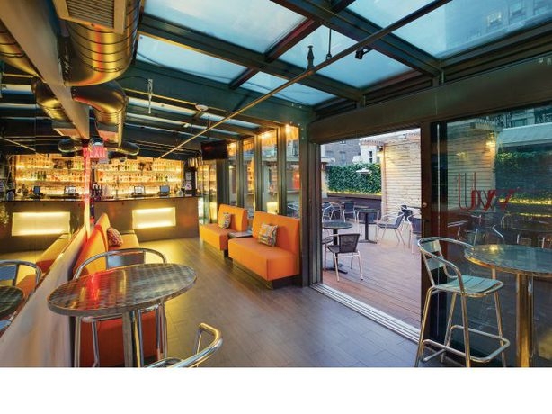 Imagen del bar/restaurante del Hotel The Hotel @ Fifth Avenue. Foto 3