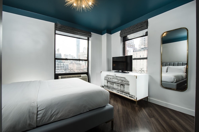 Imagen de la habitación del Hotel The Hotel @ New York City. Foto 3
