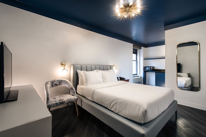 Imagen de la habitación del Hotel The Hotel @ New York City. Foto 7