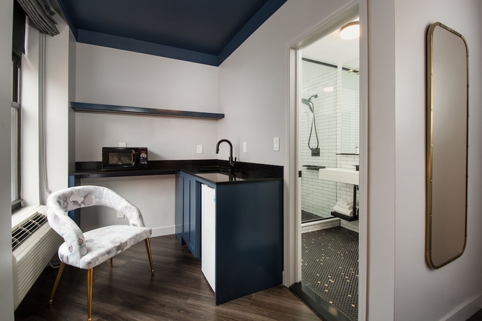 Imagen de la habitación del Hotel The Hotel @ New York City. Foto 9