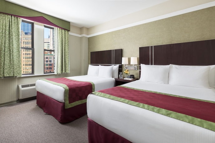 Imagen de la habitación del Hotel The Hotel @ Times Square. Foto 8