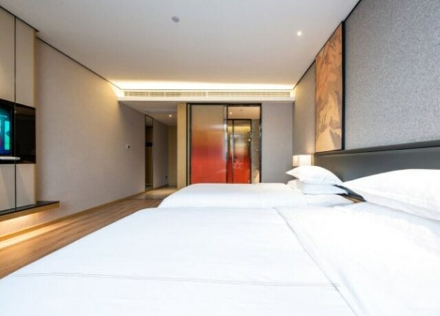 Imagen de la habitación del Hotel The Hotel V Nanjing Lishui. Foto 20