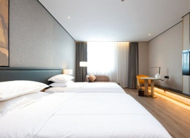 Imagen de la habitación del Hotel The Hotel V Nanjing Lishui. Foto 22