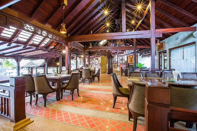 Imagen del bar/restaurante del Hotel The Hotspring Beach Resort and Spa. Foto 6
