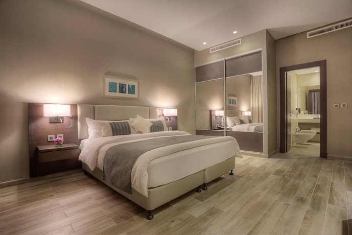 Imagen de la habitación del Hotel The House Boutique Suites. Foto 3