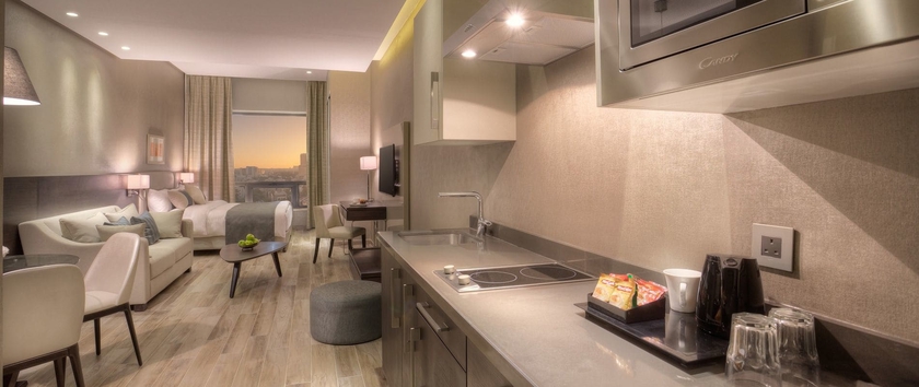 Imagen de la habitación del Hotel The House Boutique Suites. Foto 8