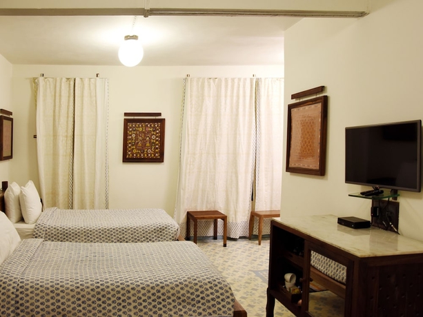 Imagen de la habitación del Hotel The House Of Mg. Foto 5