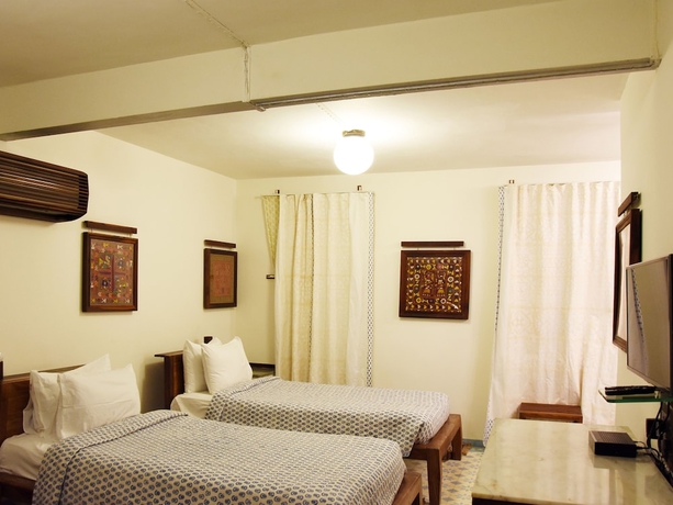 Imagen de la habitación del Hotel The House Of Mg. Foto 10