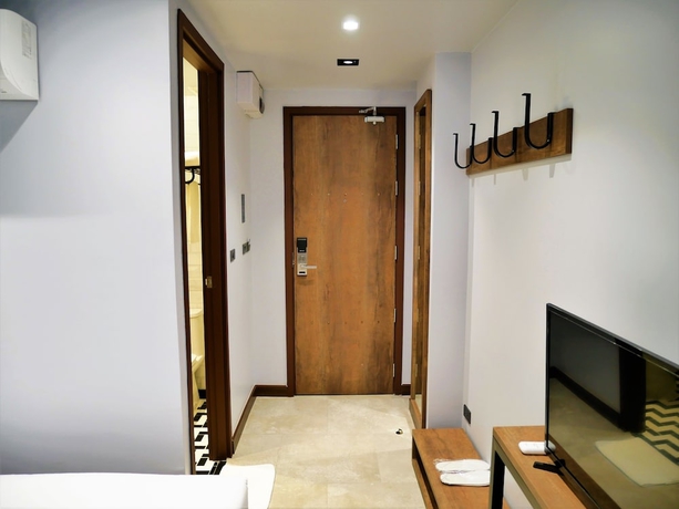 Imagen de la habitación del Hotel The House Pratunam. Foto 11
