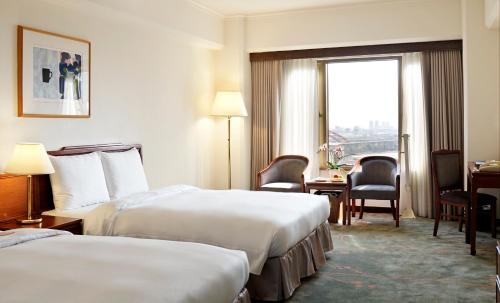 Imagen de la habitación del Hotel The Howard Prince Taichung. Foto 7