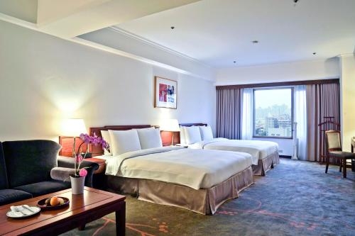 Imagen de la habitación del Hotel The Howard Prince Taichung. Foto 9