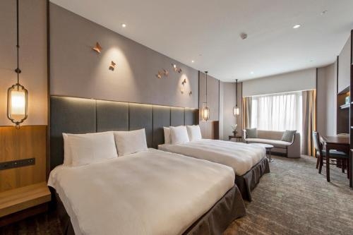 Imagen de la habitación del Hotel The Howard Prince Taichung. Foto 10