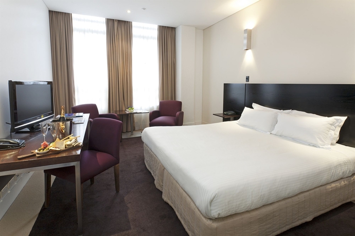 Imagen de la habitación del Hotel The Howey. Foto 13