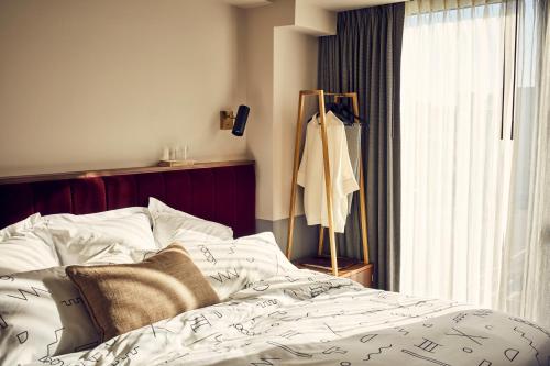 Imagen de la habitación del Hotel The Hoxton Williamsburg. Foto 11