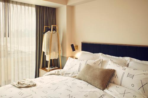 Imagen de la habitación del Hotel The Hoxton Williamsburg. Foto 17