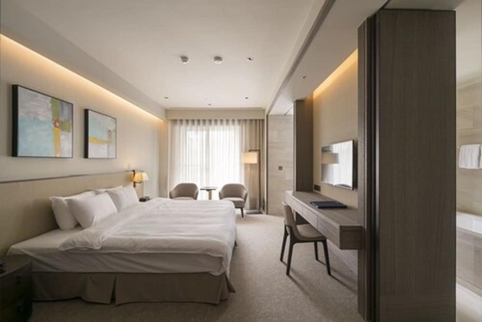 Imagen de la habitación del Hotel The Huan Taichung. Foto 7