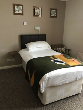 Imagen de la habitación del Hotel The Hunt Lodge. Foto 19